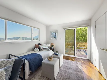 a living room with couches and a fireplace