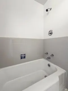 a view of a large house with a yard and plants