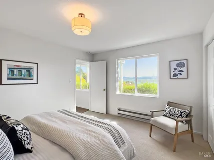 a view of a city with mountains in the background