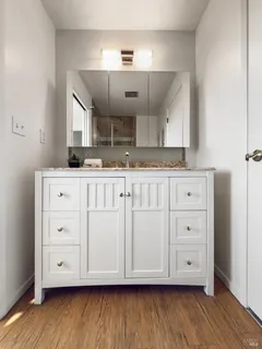 a sign that is on a brick wall