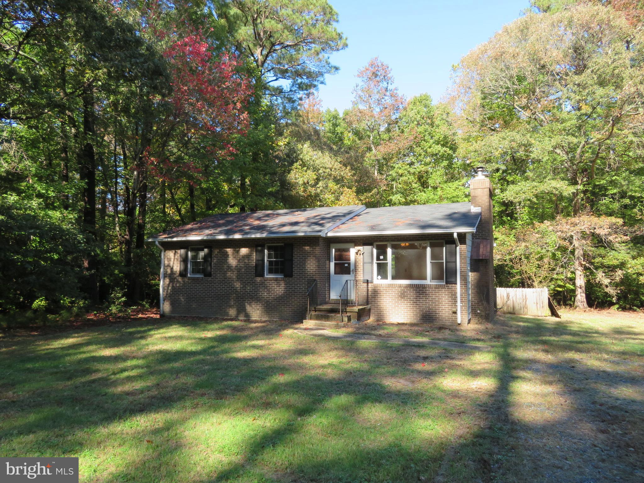 330 Pilot Way Lusby, MD 20657 - Photo 13 of 19 a view of a house with a yard