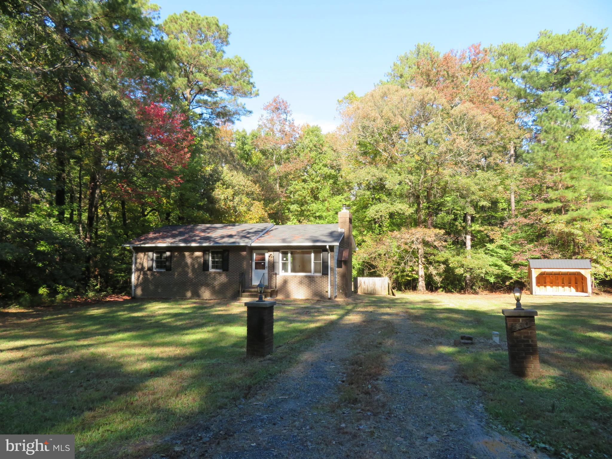 330 Pilot Way Lusby, MD 20657 - Photo 14 of 19 a view of a house with a yard