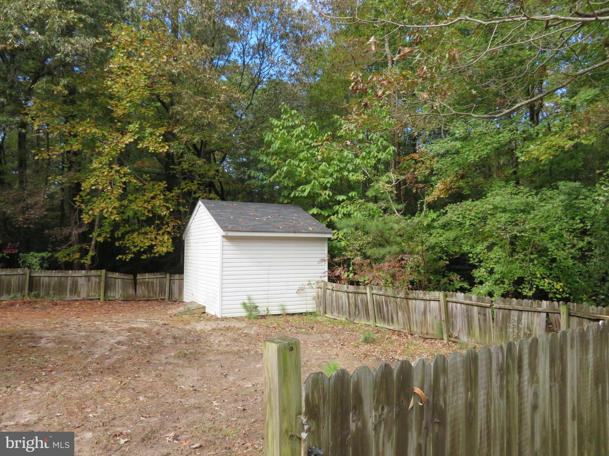 330 Pilot Way Lusby, MD 20657 - Photo 16 of 19 a house view with a backyard space