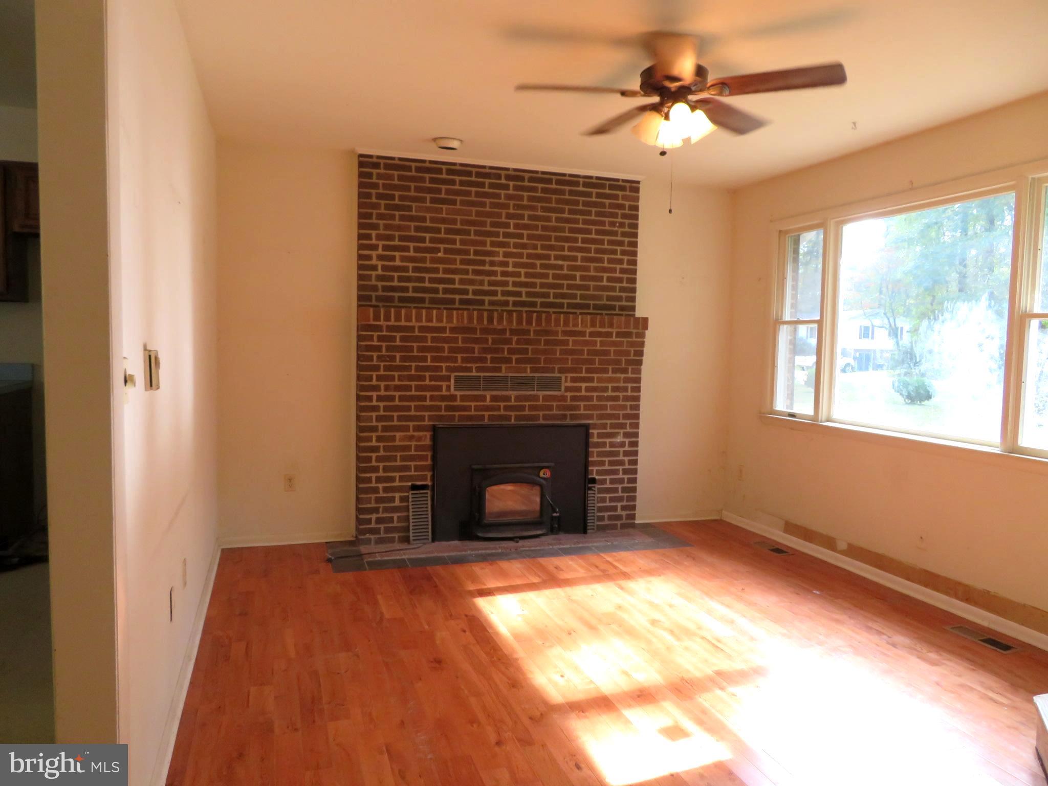 330 Pilot Way Lusby, MD 20657 - Photo 3 of 19 a view of an empty room with a window