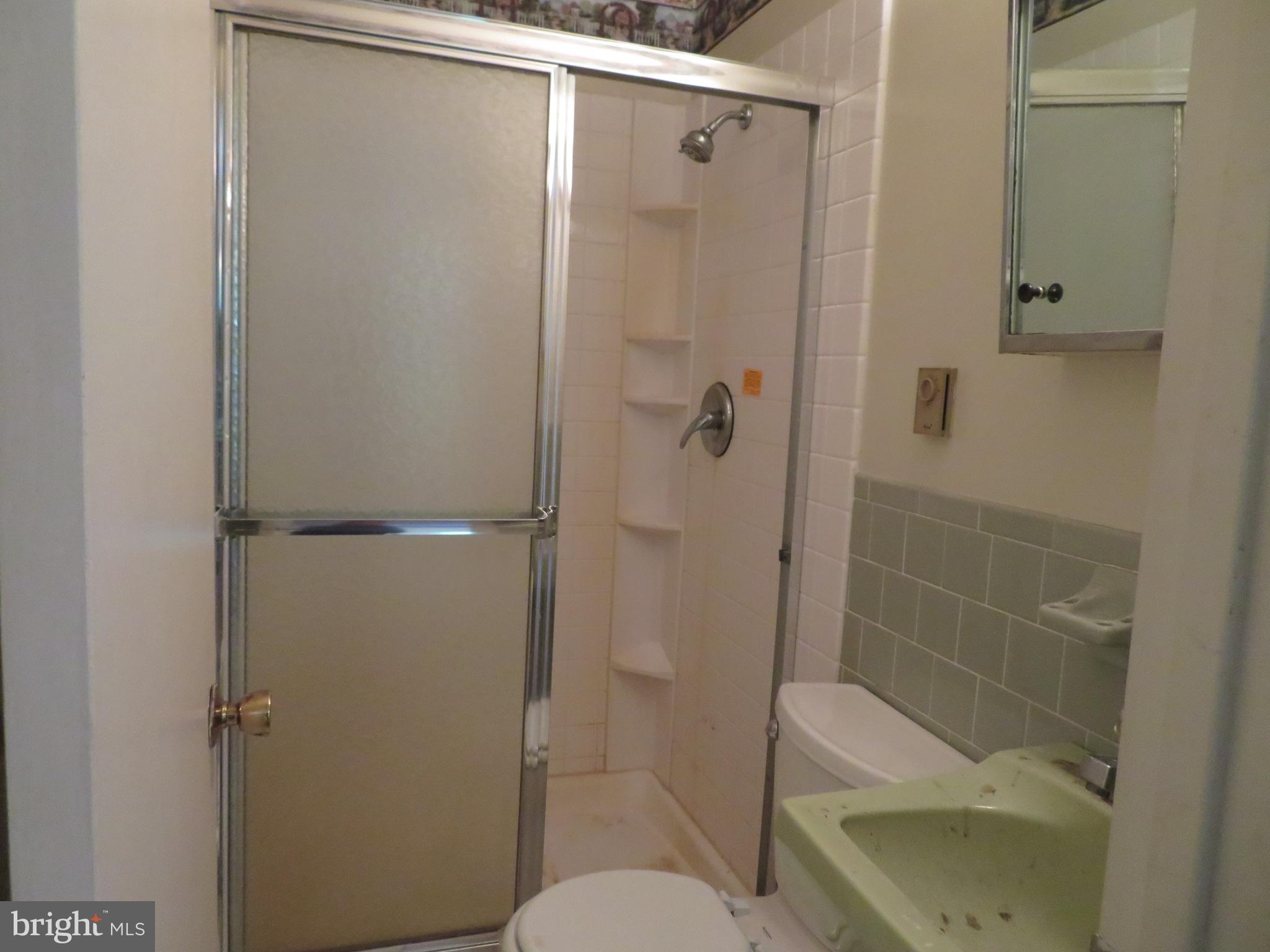 330 Pilot Way Lusby, MD 20657 - Photo 10 of 19 a bathroom with a shower and toilet