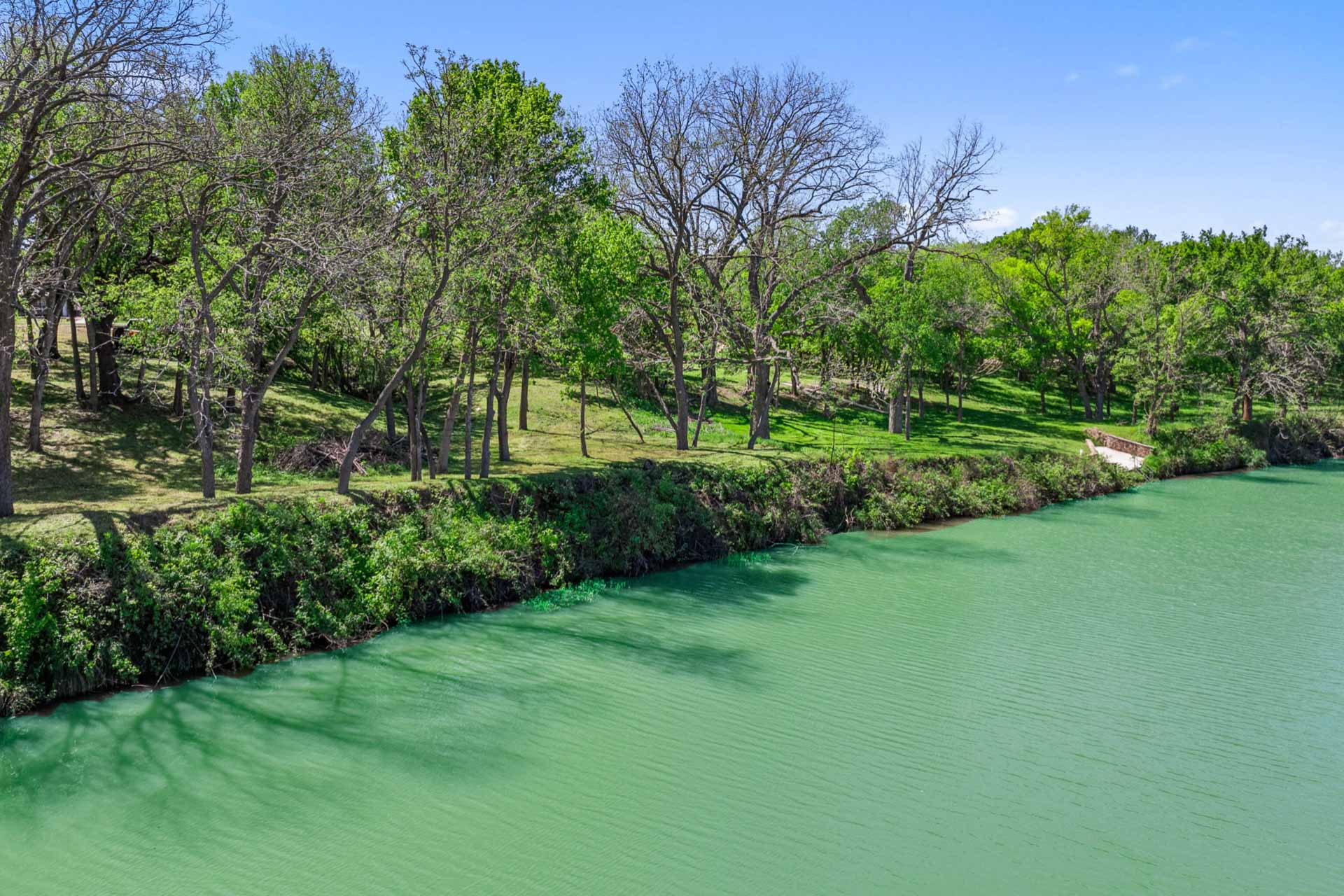 571 Ranch Road 1 Stonewall, TX 78671 - Photo 3 of 21 Water view with a tree filled landscape