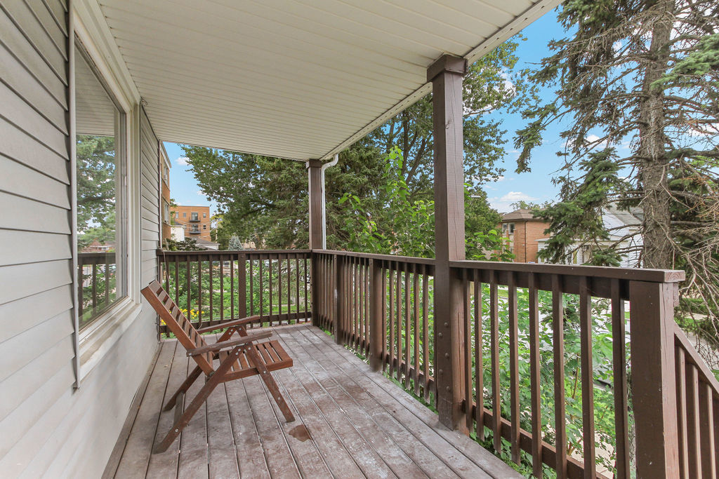 6046 West Giddings Street Chicago, IL 60630 - Photo 15 of 46 a view of balcony with wooden floor