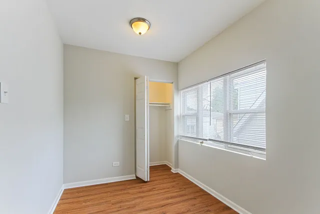 a bathroom with a sink a bathtub and window