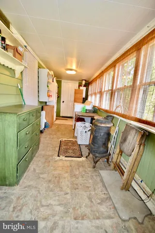 a living room with furniture window and a table