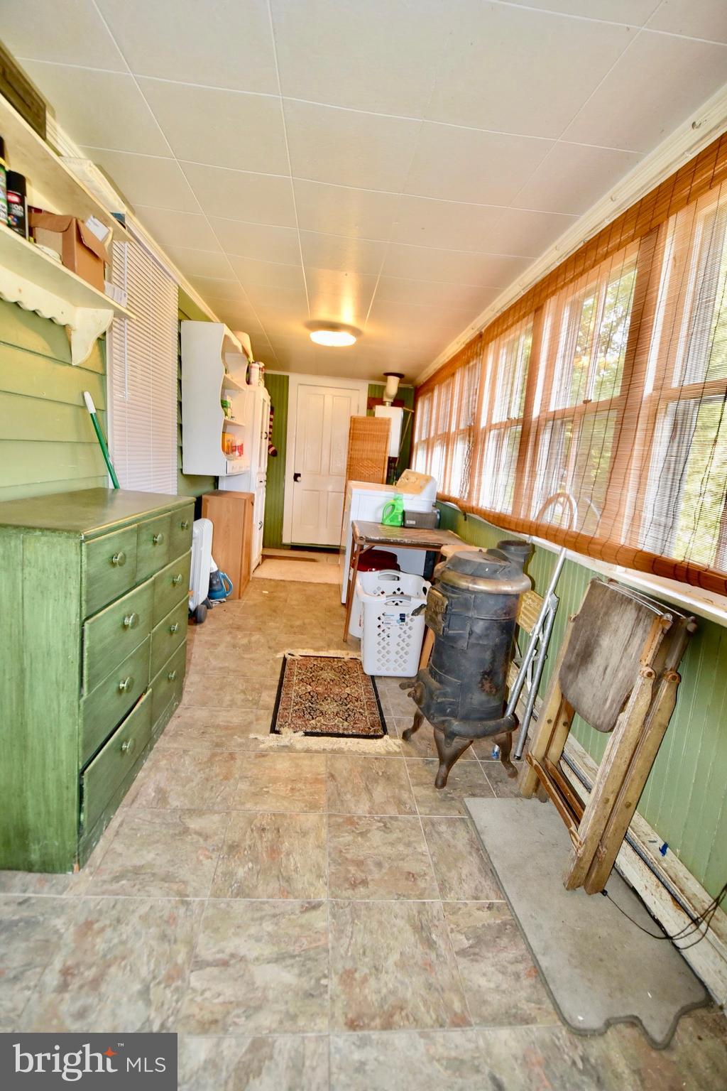 407 Main Street Sharptown, MD 21861 - Photo 11 of 32 a living room with furniture window and a table