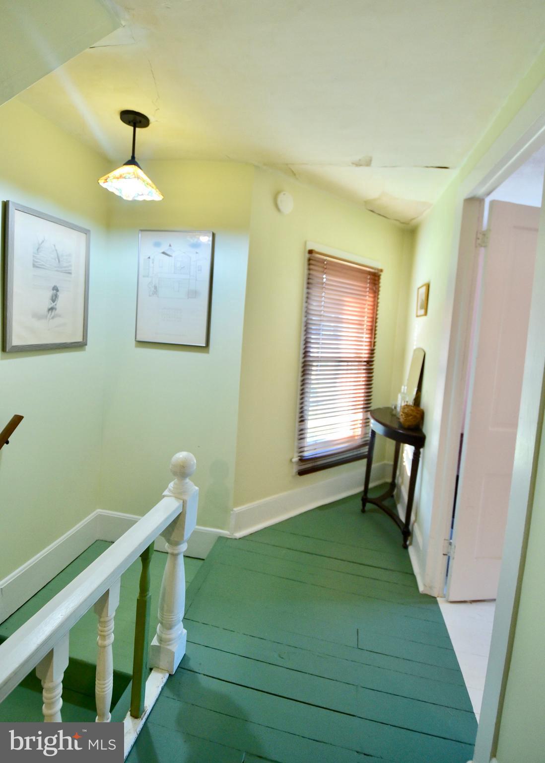 407 Main Street Sharptown, MD 21861 - Photo 15 of 32 a view of entryway with a window and wooden floor