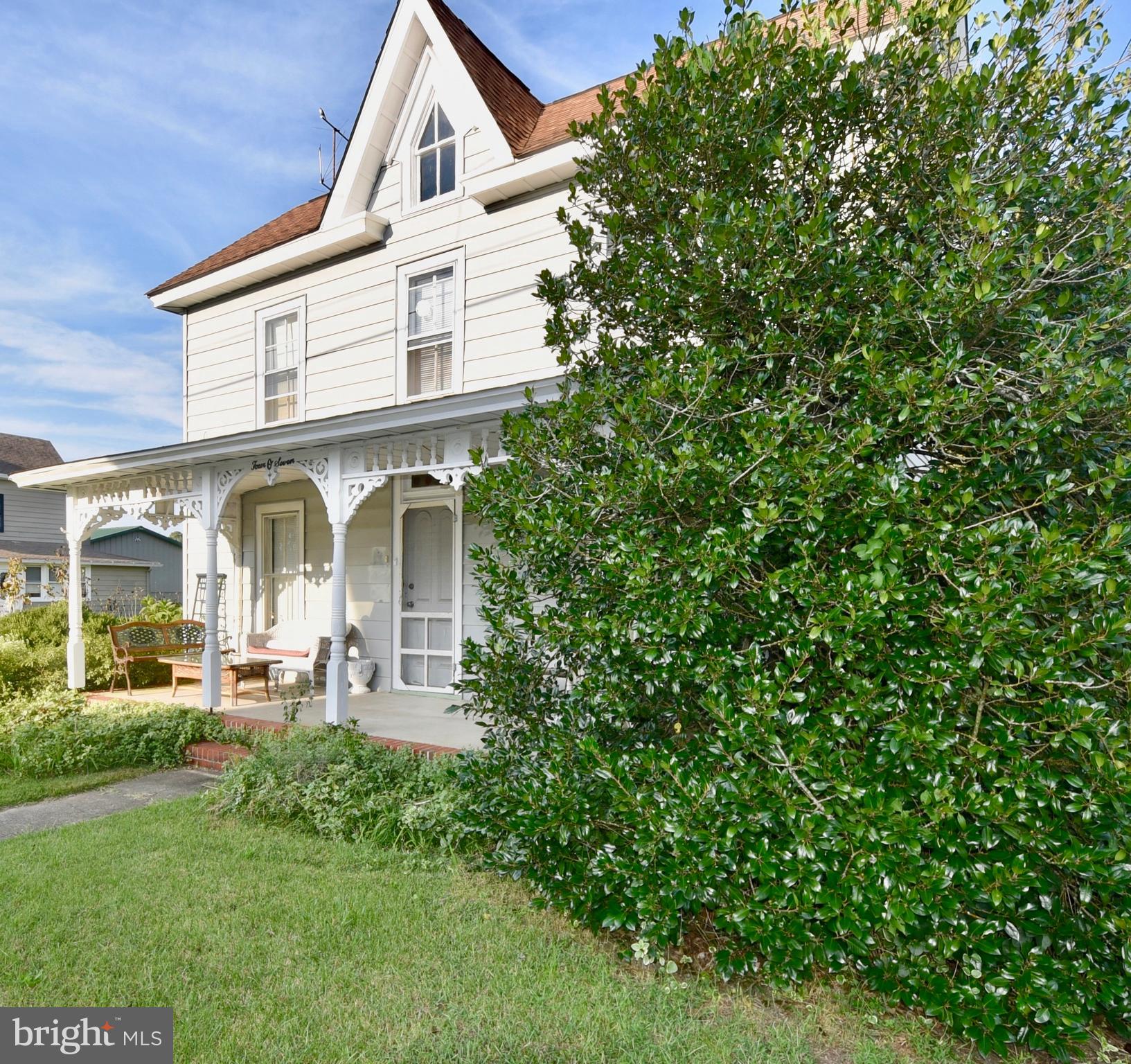 407 Main Street Sharptown, MD 21861 - Photo 31 of 32 front view of a house with a big yard