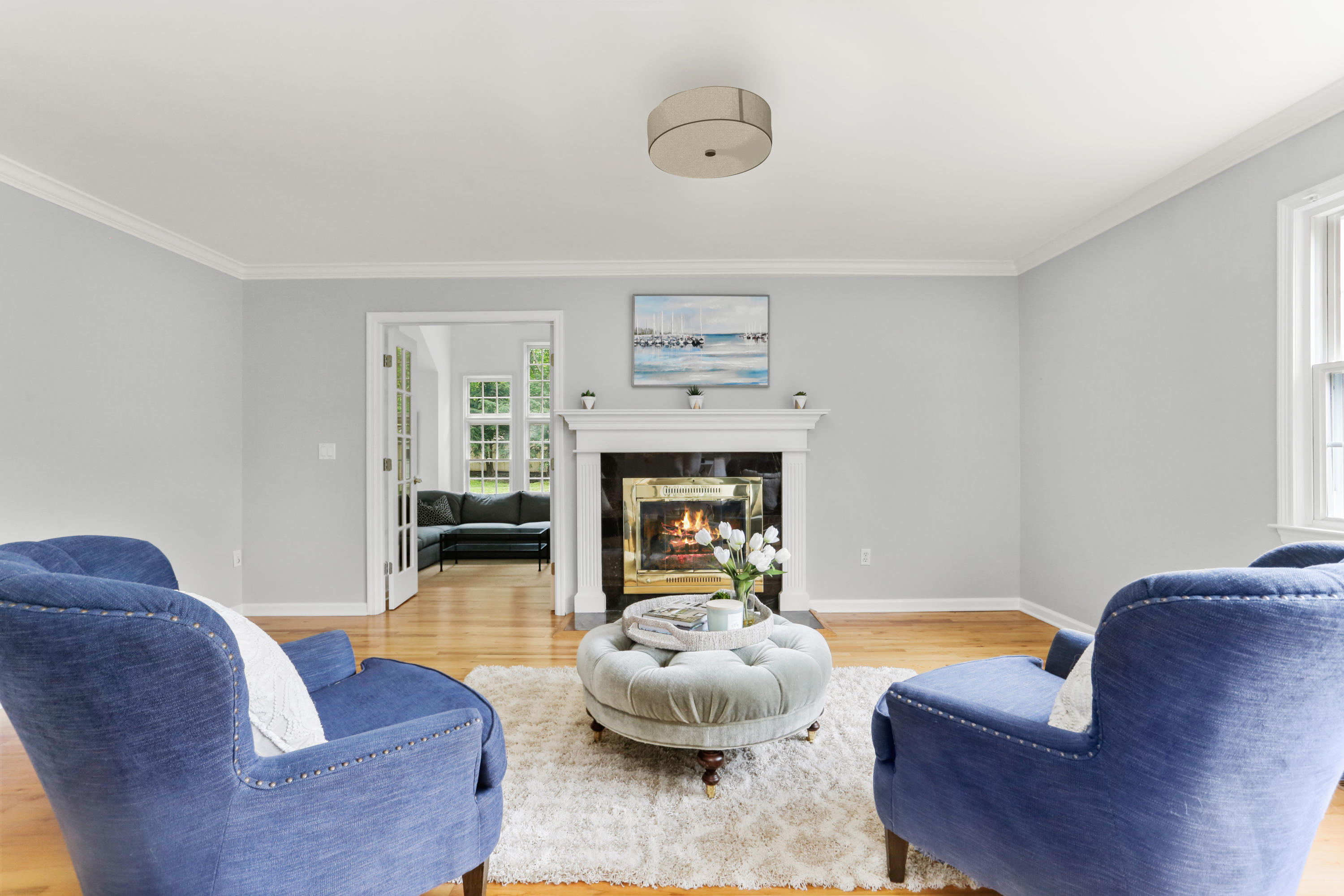 53 Country Club Road Darien, CT 06820 - Photo 16 of 35 a living room with furniture and a fireplace