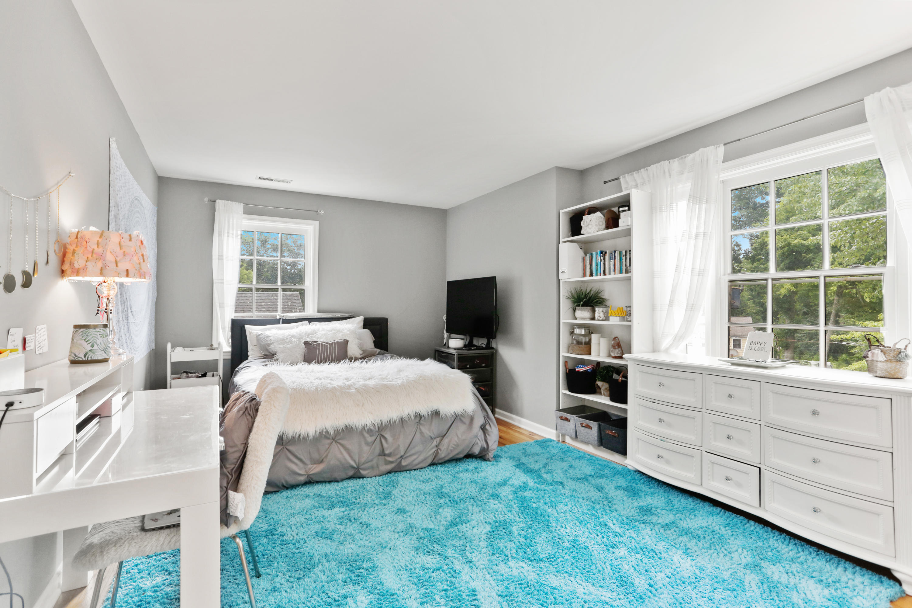 53 Country Club Road Darien, CT 06820 - Photo 20 of 35 a bedroom with a bed and a flat screen tv