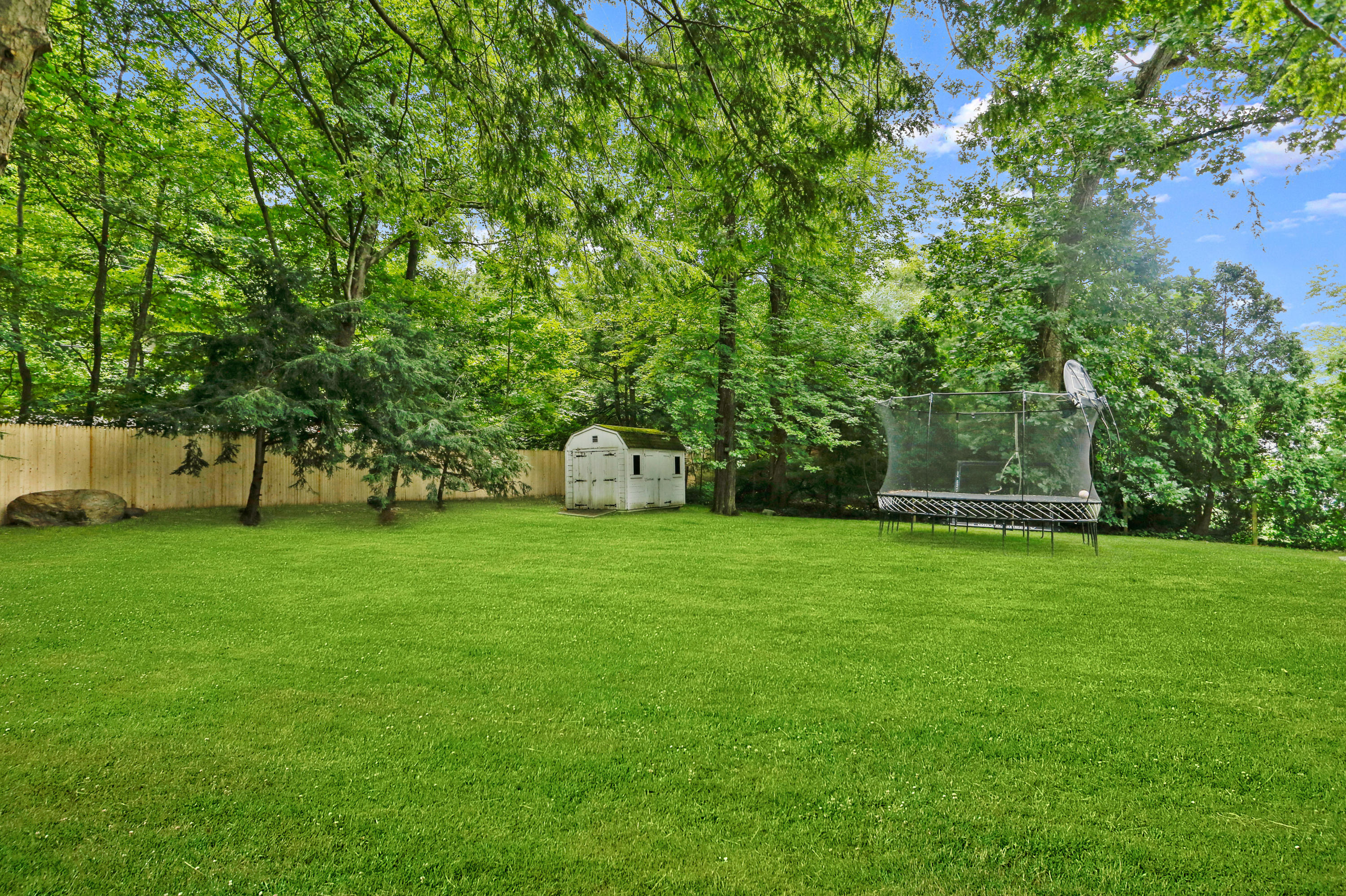 53 Country Club Road Darien, CT 06820 - Photo 32 of 35 a view of a garden