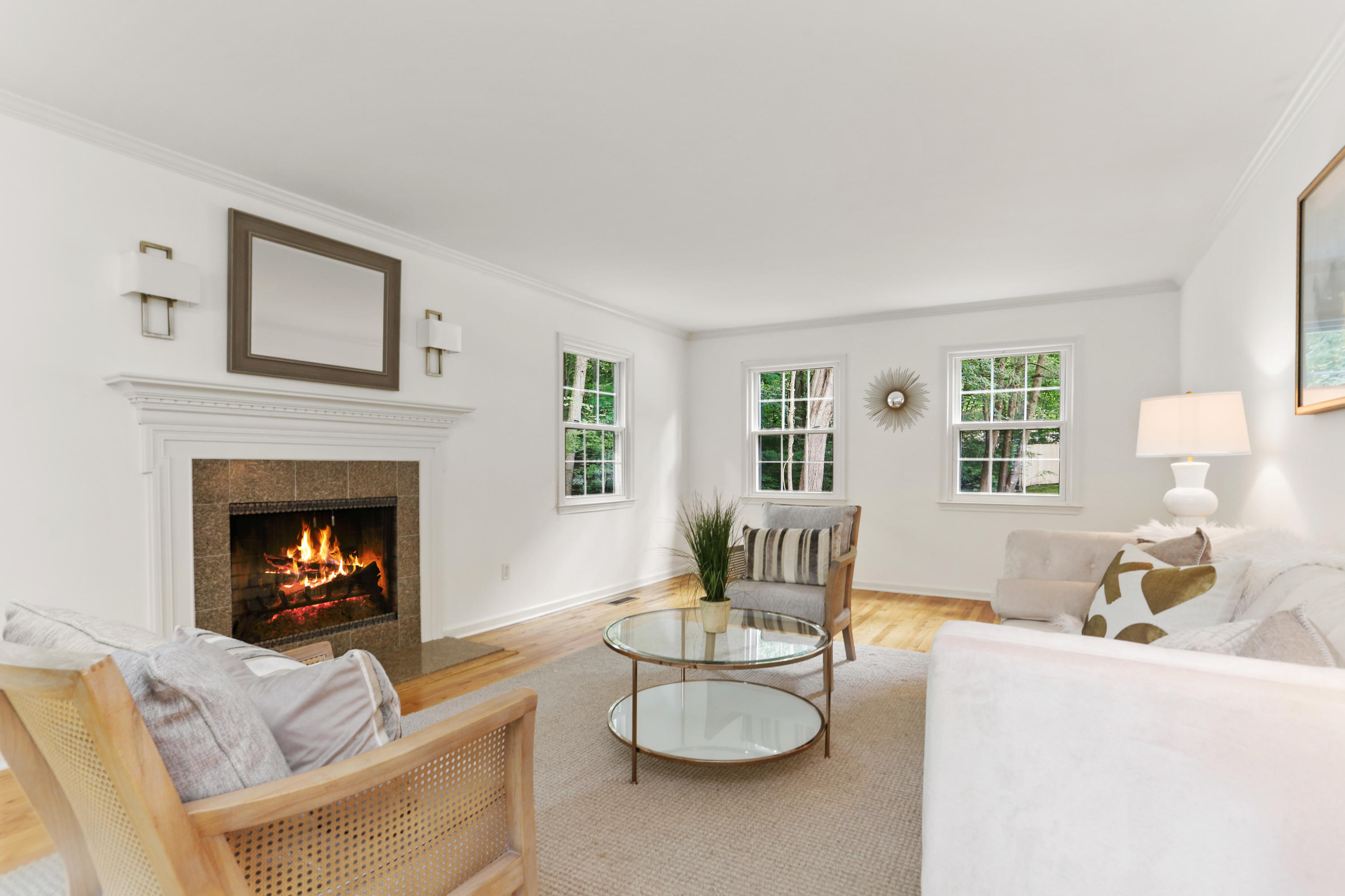 53 Country Club Road Darien, CT 06820 - Photo 6 of 35 a living room with furniture and a fireplace