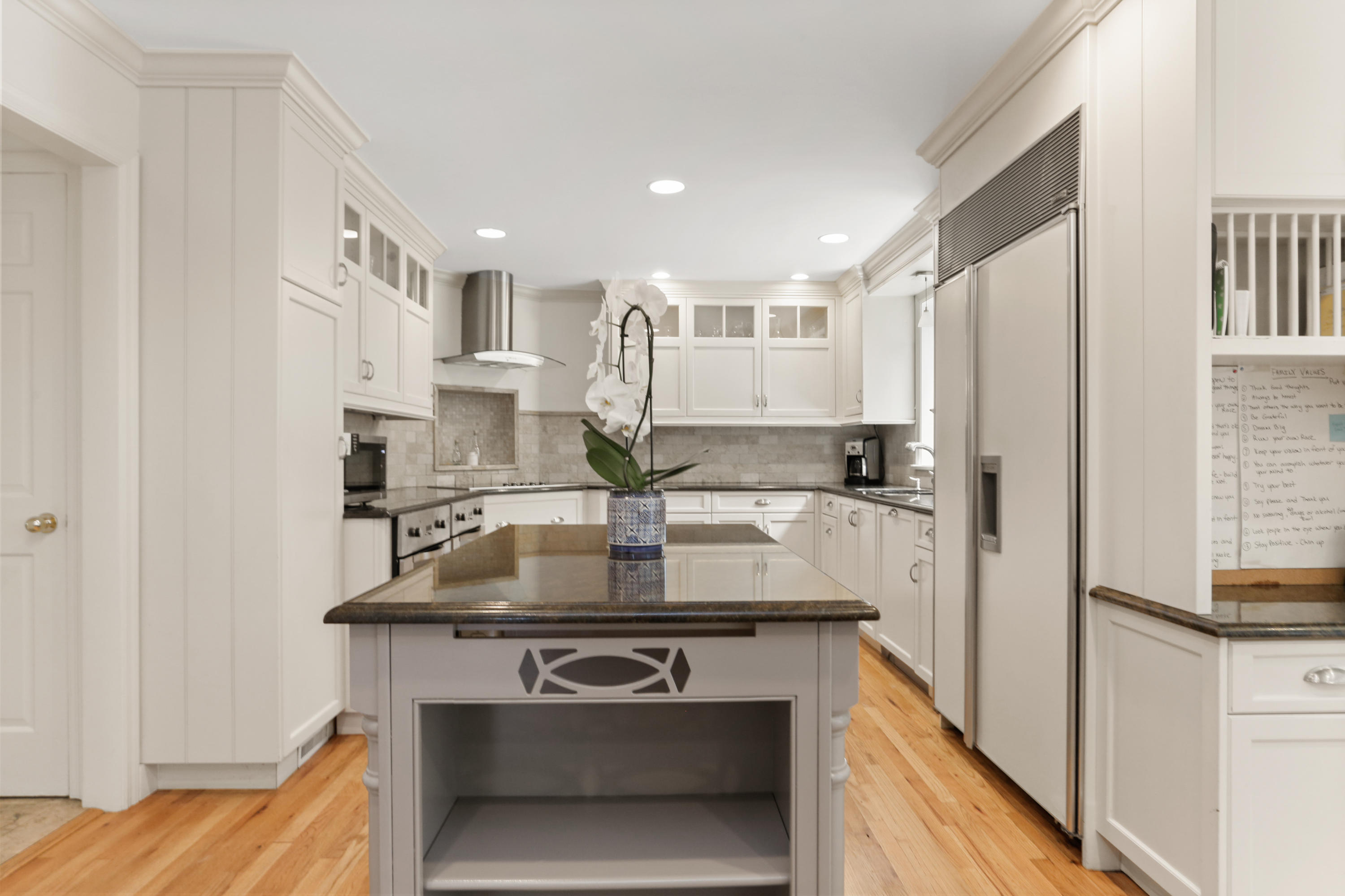 53 Country Club Road Darien, CT 06820 - Photo 8 of 35 a kitchen with stainless steel appliances granite countertop a sink stove and refrigerator