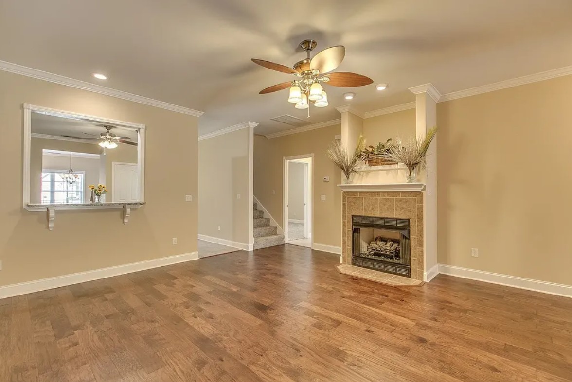 2208 Stanford Court Murfreesboro, TN 37130 - Photo 7 of 18 a view of an empty room with a fireplace and a window