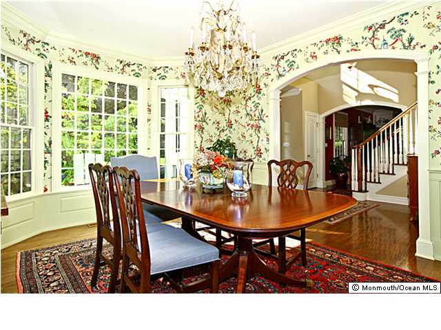 20 Robin Road Rumson, NJ 07760 - Photo 13 of 16 a view of a dining room with furniture and wooden floor