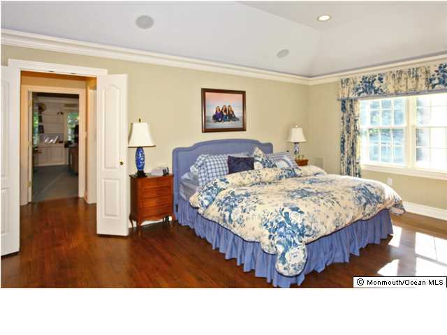 20 Robin Road Rumson, NJ 07760 - Photo 14 of 16 a living room with a bed and dresser with wooden floor