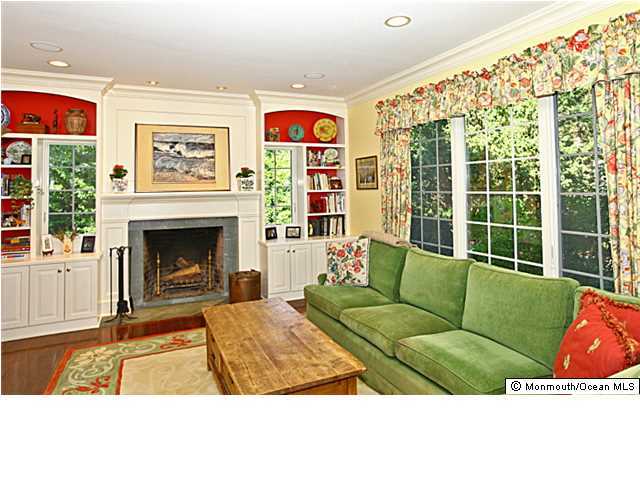 20 Robin Road Rumson, NJ 07760 - Photo 2 of 16 a living room with furniture and a fireplace