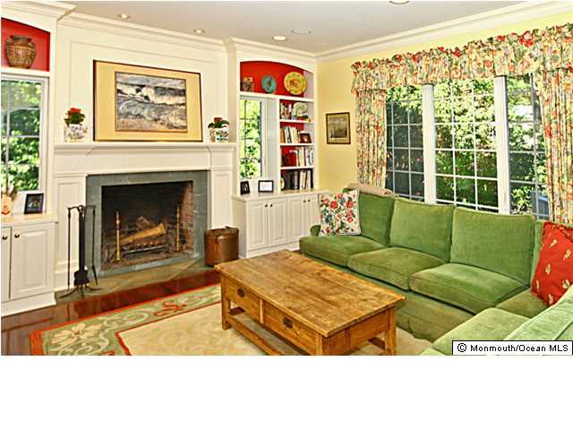 20 Robin Road Rumson, NJ 07760 - Photo 7 of 16 a living room with furniture and a fireplace