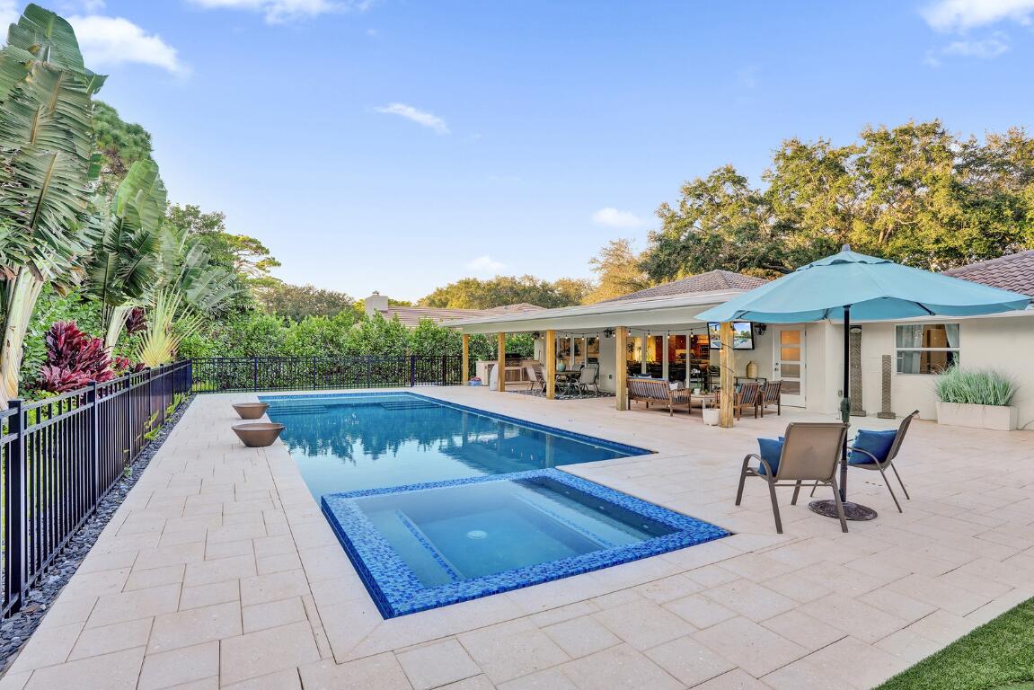 3681 Northwest 24th Terrace Boca Raton, FL 33431 - Photo 54 of 78 a view of a patio with swimming pool