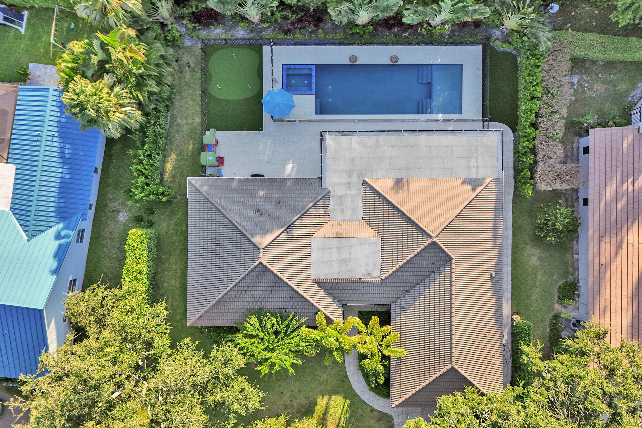 3681 Northwest 24th Terrace Boca Raton, FL 33431 - Photo 64 of 78 an aerial view of a house with a yard and garden