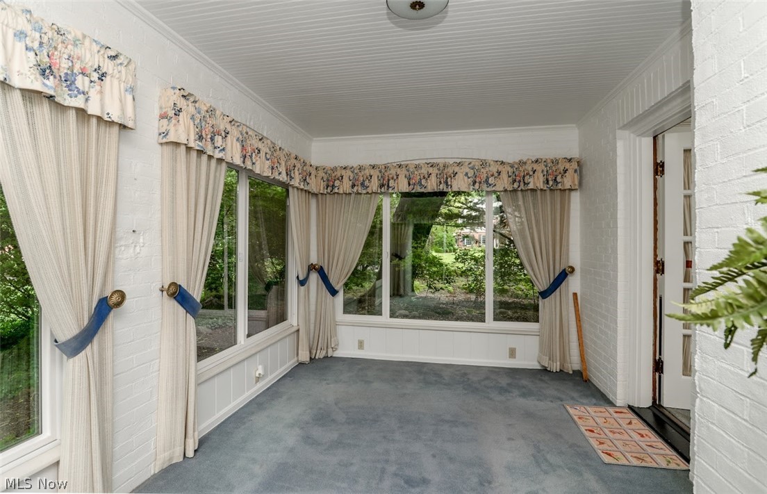 2330 Amesbury Road Akron, OH 44313 - Photo 12 of 35 Another view of sunroom with doors leading into the living room.