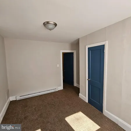 an empty room with window
