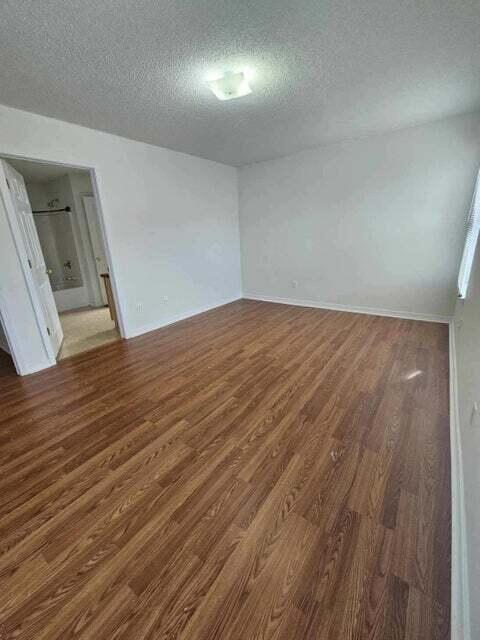 294 Limestone Circle Crestview, FL 32539 - Photo 9 of 9 a view of empty room with wooden floor
