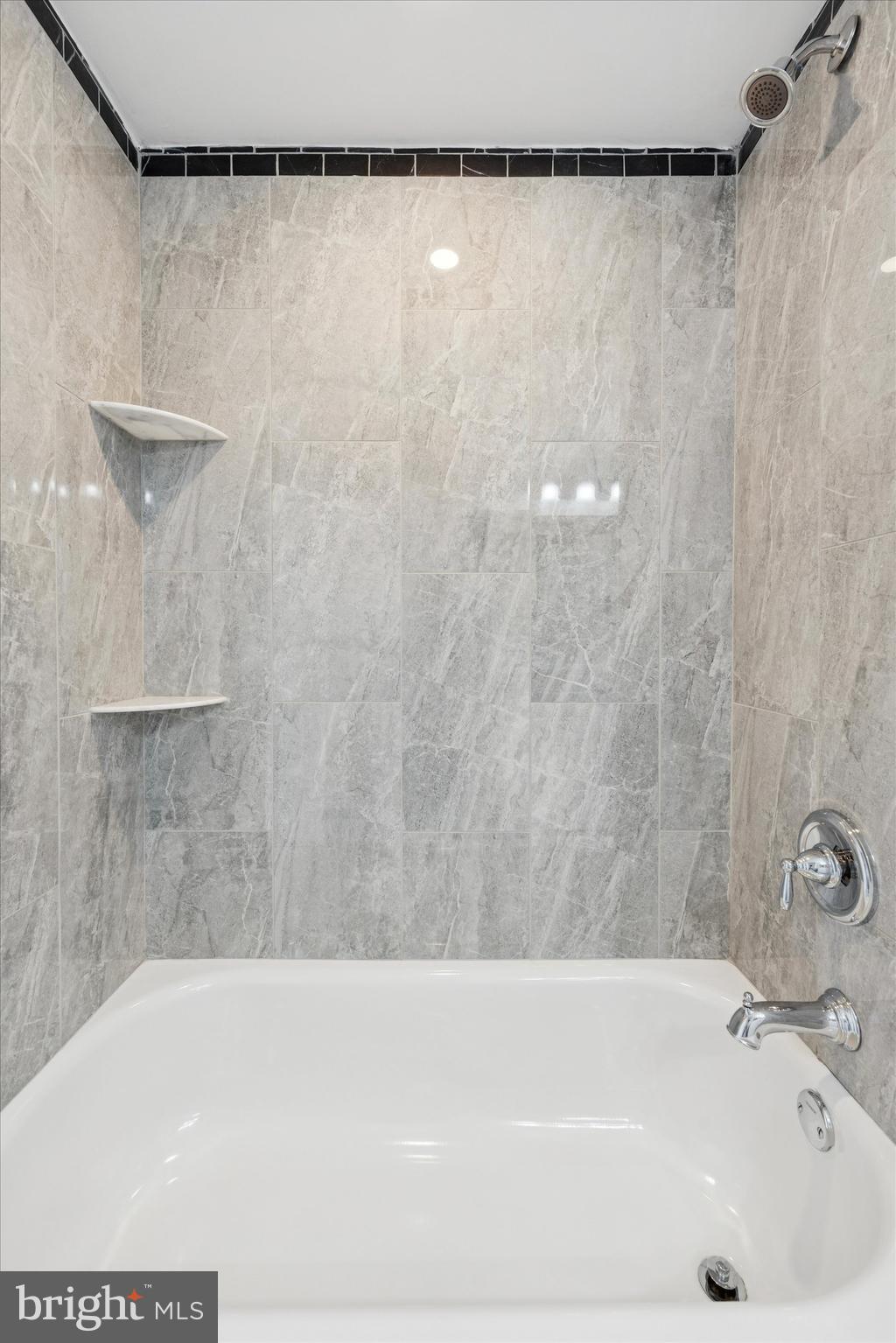 425 Grove Street Bridgeport, PA 19405 - Photo 17 of 24 a bathroom with a bathtub and shower