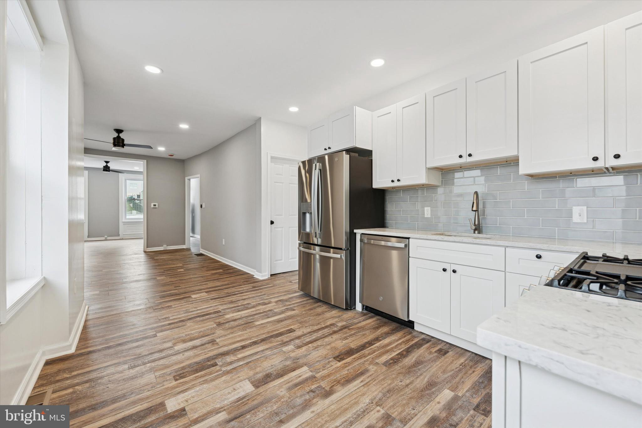 425 Grove Street Bridgeport, PA 19405 - Photo 10 of 24 a kitchen with stainless steel appliances a refrigerator sink and cabinets