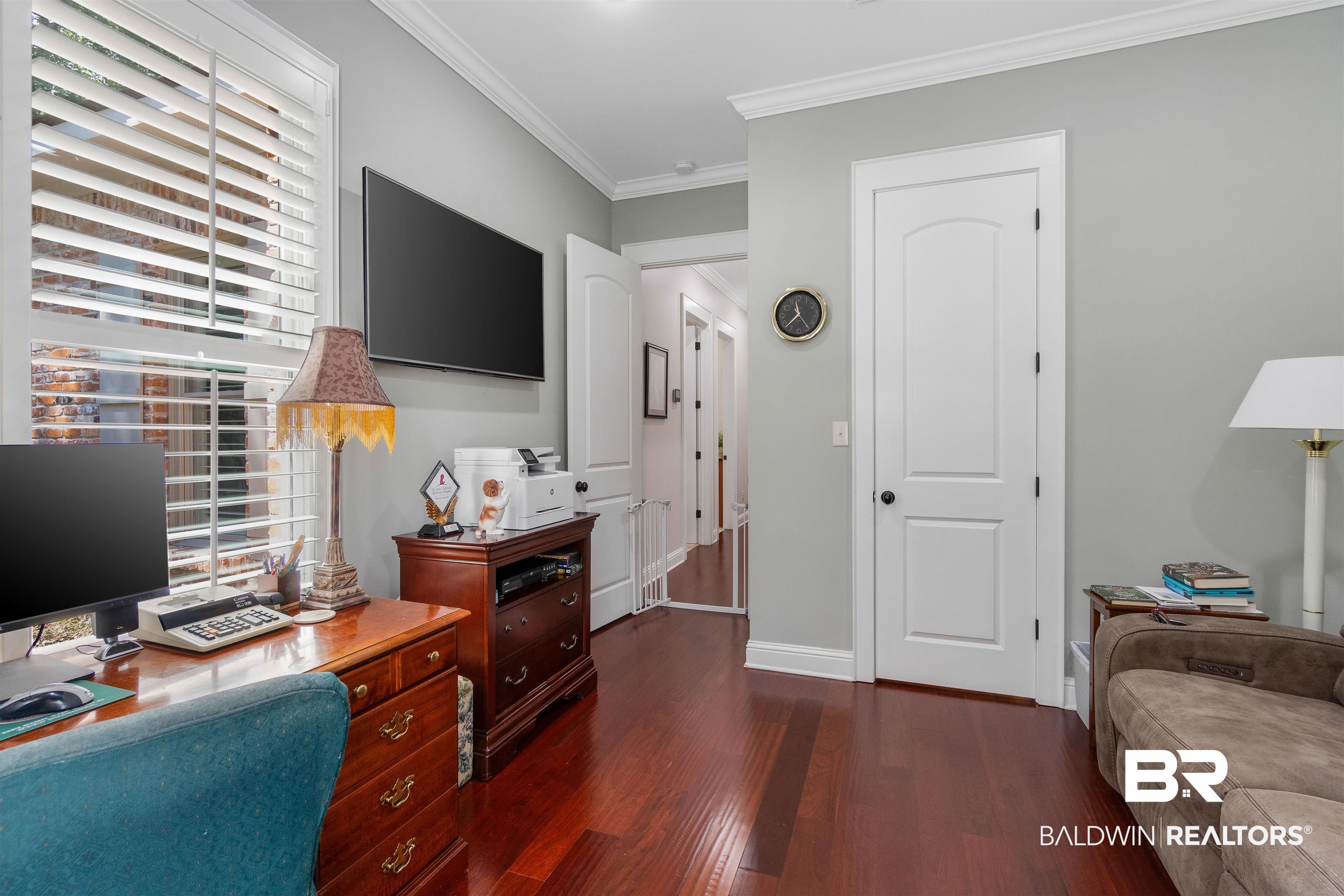 11281 Redfern Road Daphne, AL 36526 - Photo 46 of 80 Office space with crown molding and dark hardwood / wood-style flooring
