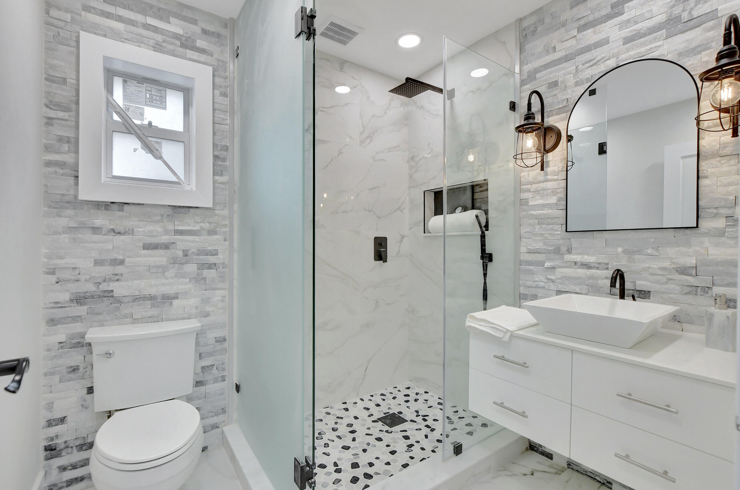 10077 Camelback Lane Boca Raton, FL 33498 - Photo 27 of 52 a bathroom with a sink a toilet and shower