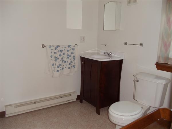 17 Meadow Road Ware, MA 01082 - Photo 14 of 15 a bathroom with a sink a toilet and shower