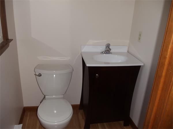 17 Meadow Road Ware, MA 01082 - Photo 7 of 15 a bathroom with a toilet sink and mirror