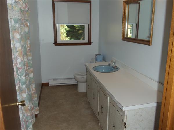 17 Meadow Road Ware, MA 01082 - Photo 10 of 15 a bathroom with a sink and a toilet