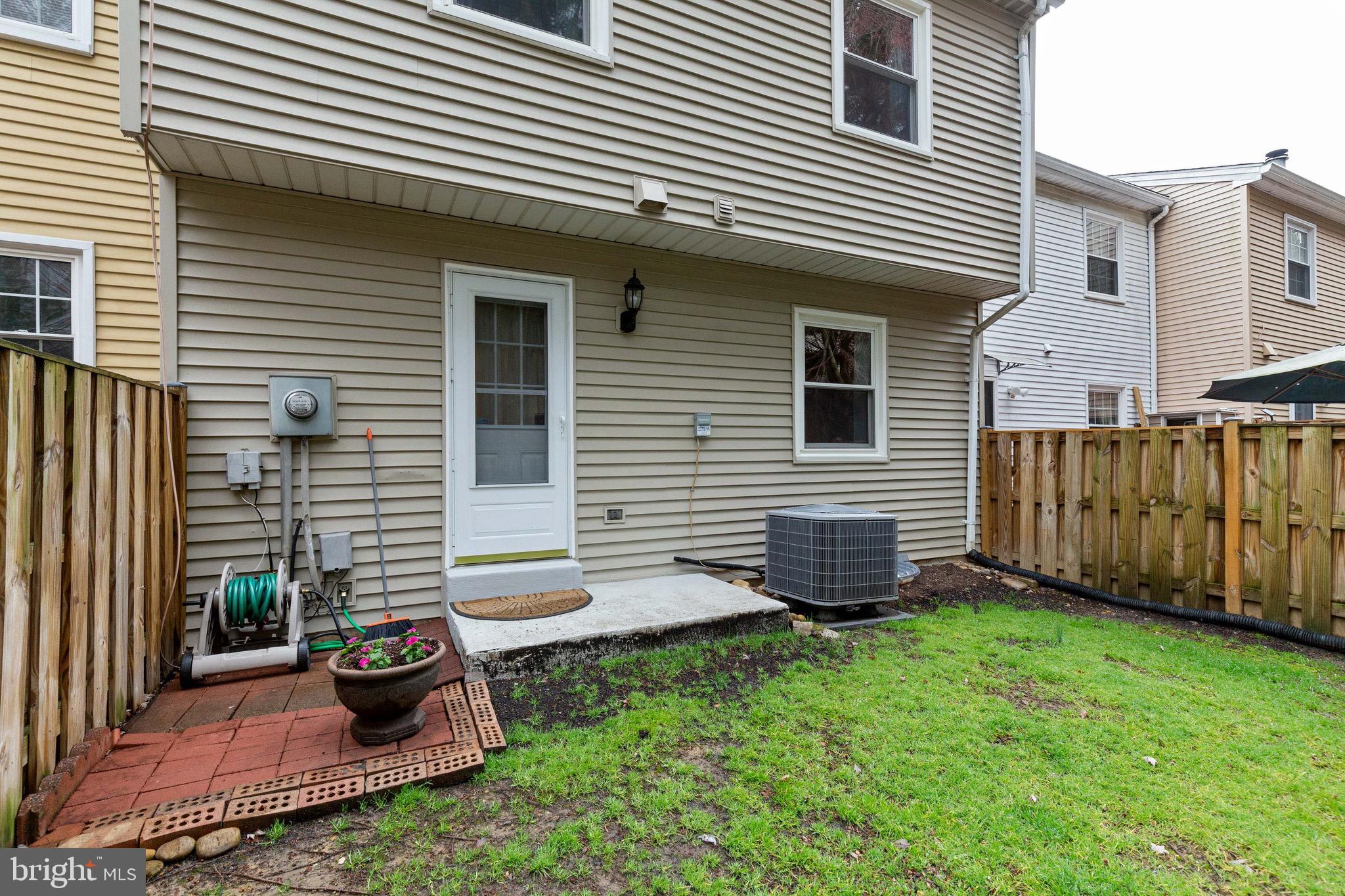 6447 Rockshire Street Alexandria, VA 22315 - Photo 37 of 42 Updated siding and bri k patio