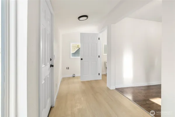 a view of a bathroom with a shower and a sink
