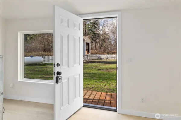 a view of a room that has a window