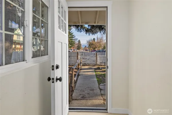 a view of a porch with wooden floor