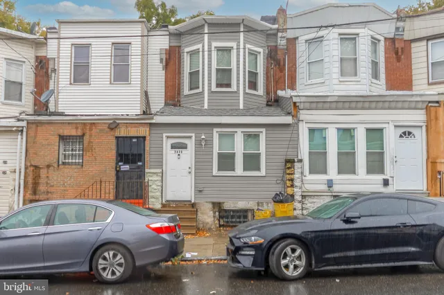 a car parked in front of a house