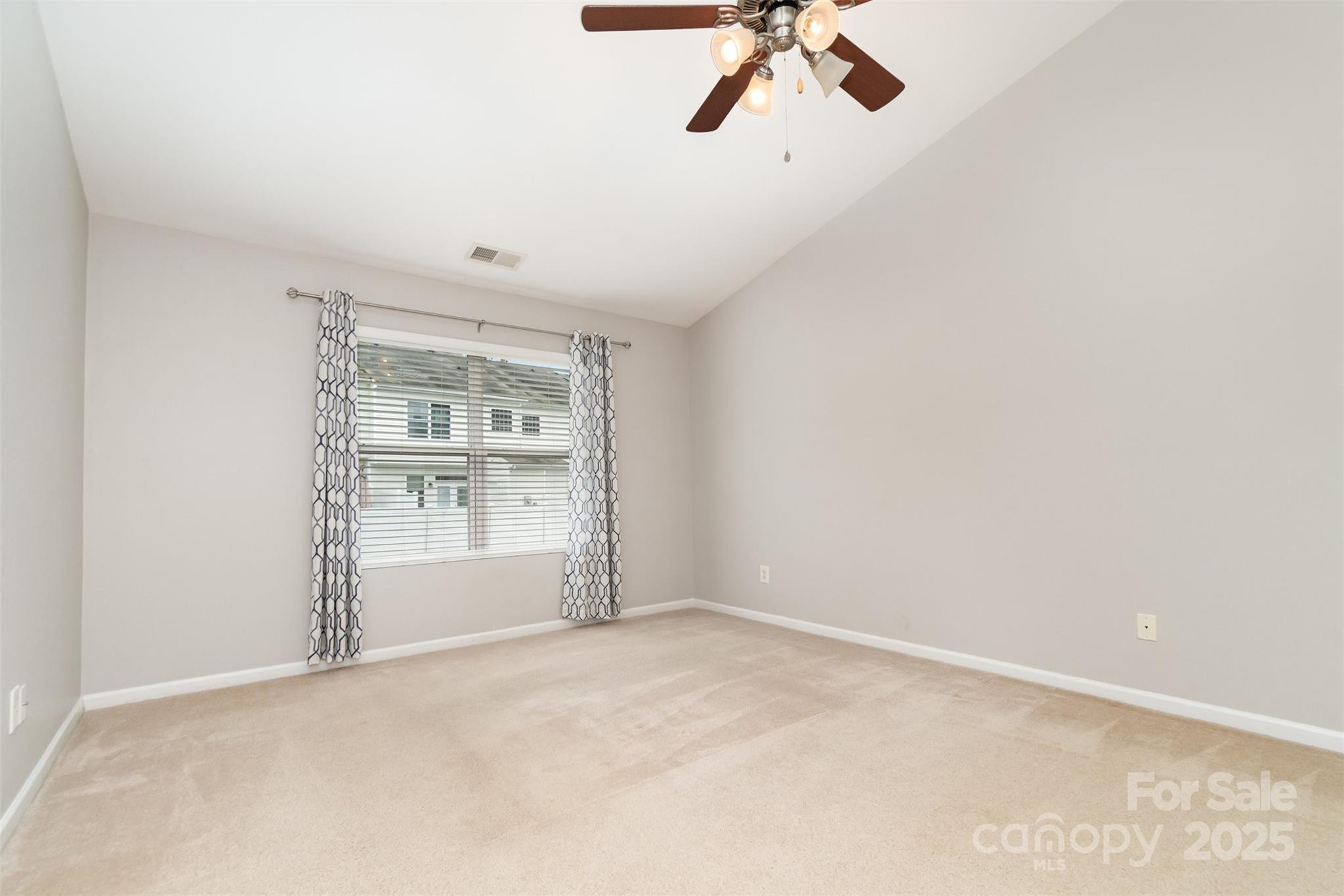 7367 Laurel Valley Road Charlotte, NC 28273 - Photo 12 of 21 a view of an empty room with a window