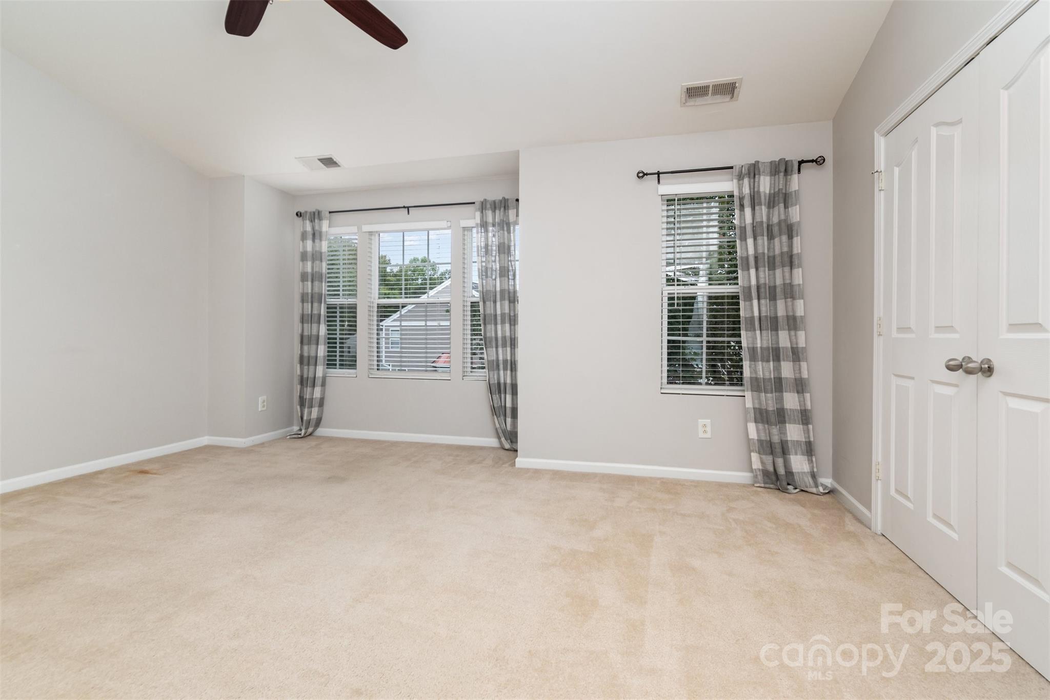 7367 Laurel Valley Road Charlotte, NC 28273 - Photo 17 of 21 an empty room with windows