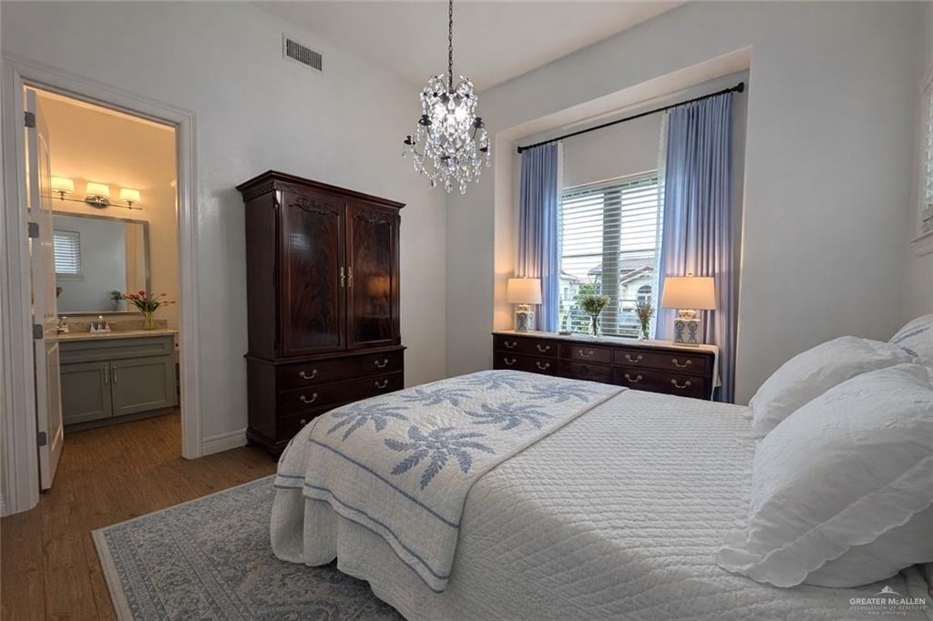 805 Grayson Avenue McAllen, TX 78504 - Photo 18 of 31 a bedroom with a bed and a window