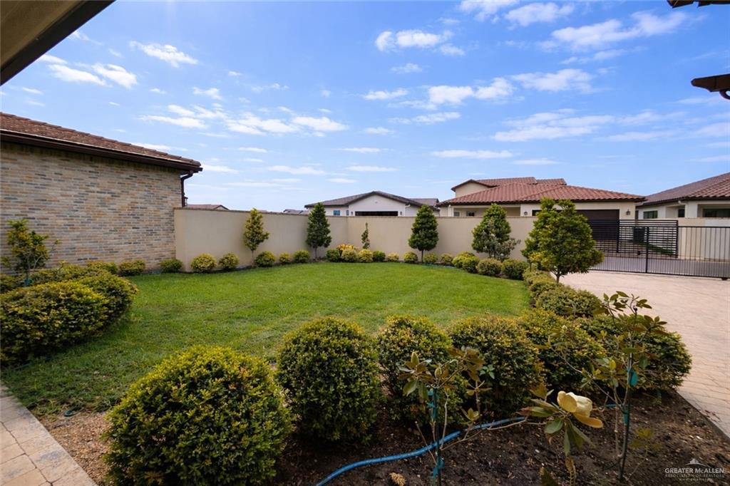 805 Grayson Avenue McAllen, TX 78504 - Photo 22 of 31 a view of a house with a garden