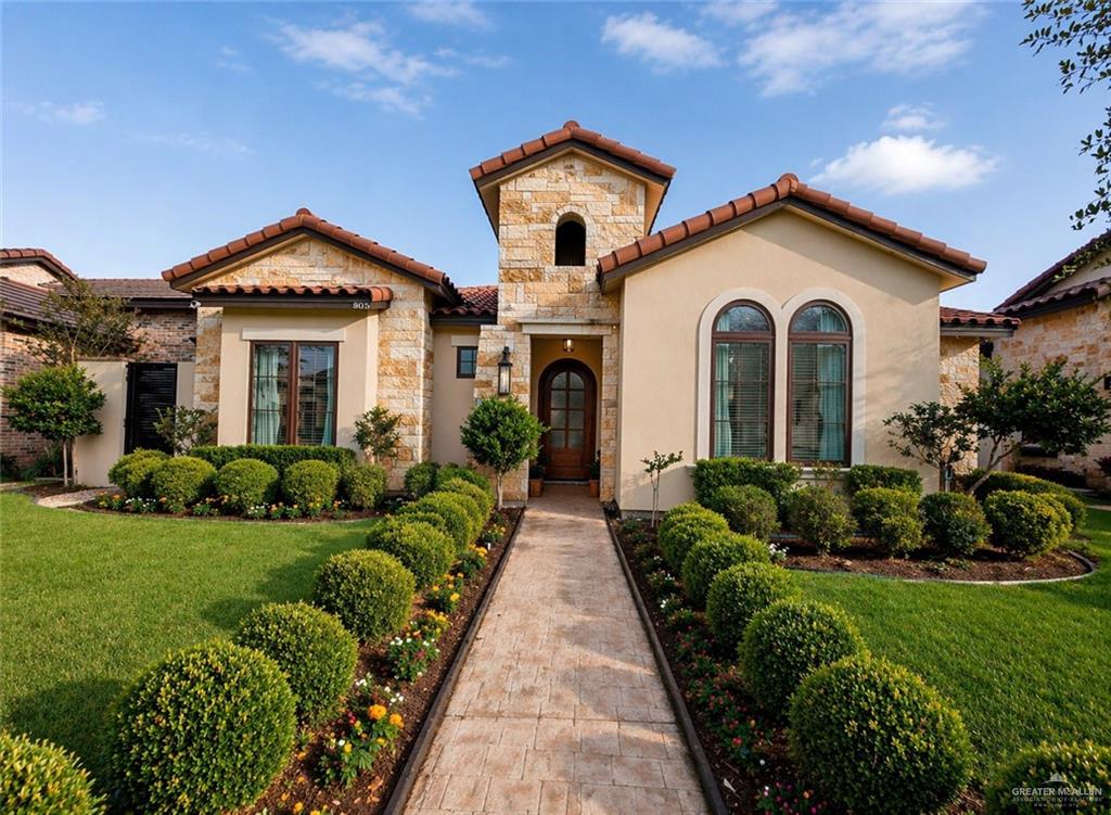 805 Grayson Avenue McAllen, TX 78504 - Photo 27 of 31 a front view of a house with a yard