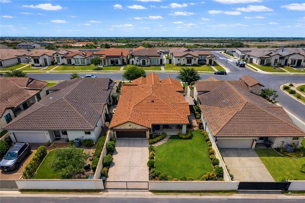 805 Grayson Avenue McAllen, TX 78504 - Photo 28 of 31 an aerial view of a house with a swimming pool outdoor seating and yard