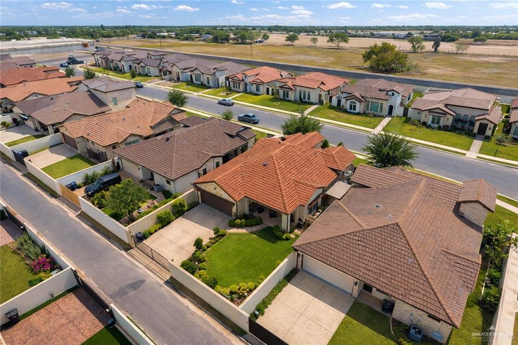 805 Grayson Avenue McAllen, TX 78504 - Photo 30 of 31 an aerial view of residential houses with outdoor space and river